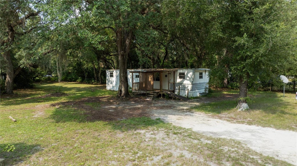 Photo of 49 NE 472nd Avenue, Old Town, FL 32680 (MLS # OM729477)