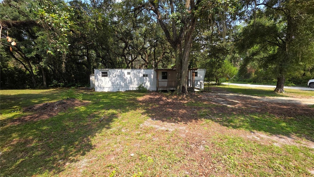 Photo of 49 NE 472nd Avenue, Old Town, FL 32680 (MLS # OM729477)