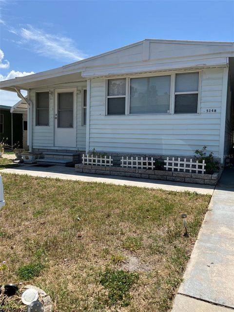 Photo of 5148 Darlington Road, Holiday, FL 34690 (MLS # TB8503855)