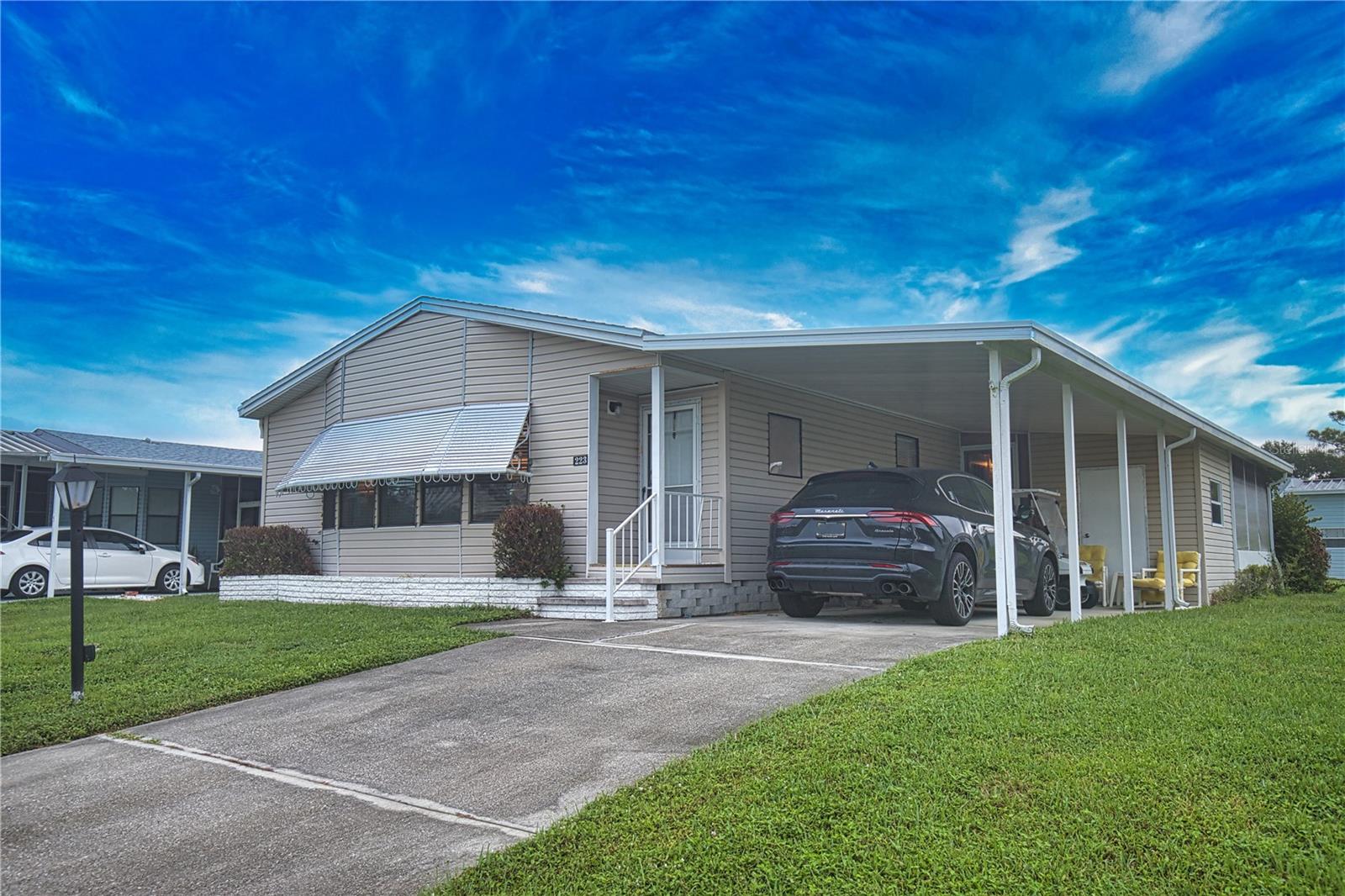 This is your chance to capture a slice of paradise in this vibrant 55+ community! This charming home features a cozy, private enclosed porch to enjoy your morning coffee or an evening adult beverage. The open kitchen/dining/living room area is perfect for entertaining guests. The primary bedroom is spacious with an ensuite bath that has both a walk-in shower and soaking tub. Your overnight guests will be very comfortable in the secondary bedroom which boasts 2 closets. Adding to the comfort this home provides, the washer and dryer are located inside so you won't have the inconvenience of carrying laundry to an outside area.
La Casa boasts 974 homes nestled among a variety of native trees with spacious common grounds surrounding our eight lakes. Our lots average a generous 60' by 80'. The ultimate lifestyle on Florida’s Gulf Coast is located between Sarasota and Fort Myers and is a boater's dream with access to the Gulf of Mexico. It is convenient for shopping, sightseeing, golfing, fishing, and boating, as well as all the culture and elegance the Southwest Florida area is noted for. Residents and visitors enjoy the warmth of Southwest Florida winters in a relaxed and unhurried environment far removed from the hustle of Florida’s east coast. You’ll be surrounded by mature lush landscaping which demonstrates the utmost level of care our property receives from residents and management. La Casa may have the best pools in the area. Our crown jewel is an extremely large, 40 X 60-foot swimming pool that is kept at a perfect 87 degrees. Our smaller 20 x 40 pool is quietly nestled between the clubhouse and the Activity Building. Both pools have adjacent hot tubs which are ideal for soaking muscles that are tired from golfing or tennis. Wireless Internet (Wi-Fi) is available at the Clubhouse, Activity Building, and Recreation Hall area where these pools & spas are located, so you can catch some rays while you catch up on your email! Sound enticing? La Casa is a friendly, family community. You will be away from the hustle and bustle except when you want to be part of it. Come for a visit to this self-contained oasis and see for yourself why La Casa is the ultimate destination for both snowbirds and year-round residents!