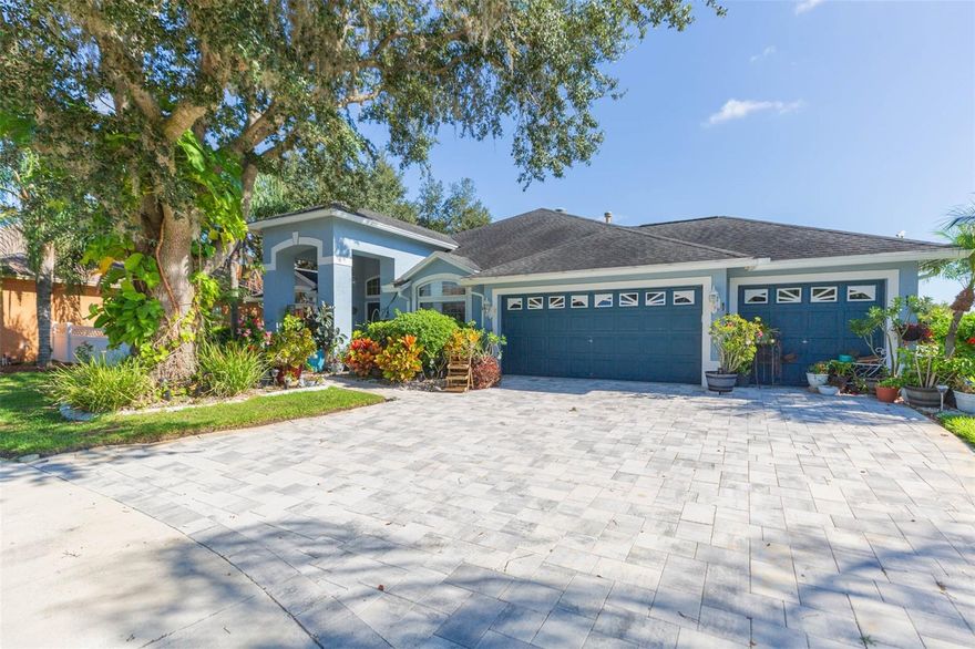 PRIME LOCATION, PREMIUM STYLE, AND HIGH-END UPGRADES. Be prepared to be impressed by this stunning home located in a gated community of Kingshyre with NO CDD’S and low HOA fees!!! This 4 bedroom, 3 bathroom, 3 car garage, POOL plus formal den features an over sized conservation corner lot (nearly a half-acre), formal dining, open floor plan, new floors and windows throughout the house, new sliding door, huge renovated kitchen and stainless steel appliances, plant shelves, decorative lighting, island and breakfast nook, wood burning fireplace, heated pool with a new pool heater with screen enclosure paved deck perfect for entertaining family and friends, overlooking a huge conservation, lots of closet space, a master suite with his/her closets, a renovated ensuite with a jacuzzi with light and music, European shower, renovated guess bathrooms, gutter system throughout, freshly painted inside and out, newer water softner, Generac stand-by generator and much, much more! Amazing location just minutes from Elementary and Middle school, Library, sports fields, family park, dogs park, Wiregrass Mall, Groves Shopping Center, Tampa Premium Outlet Mall, Restaurants, Hospital and I-75 & I-275 for easy commute. MUST SEE IN PERSON TO REALLY APPRECIATE THE ELEGANCE AND UNIQUENESS OF THIS HOME.