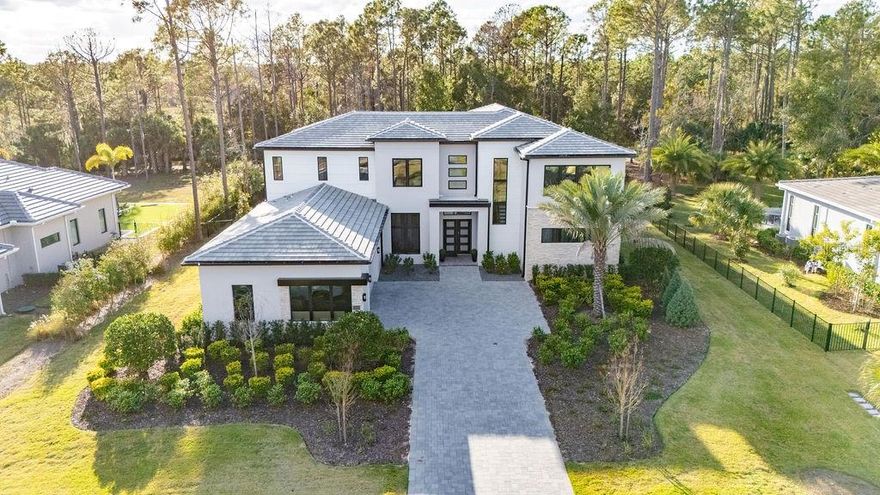 Welcome to this exceptional Toll Brothers residence offering 6,307 sq. ft. of refined living on a rare 1.16-acre flat lot — an ideal combination of luxury, space, and privacy. This elegant 5-bedroom, 6-bath plus 1 half-bath home delivers a modern, open-concept layout with premium finishes throughout.
The entire home features laminate flooring — carpet only in theater, providing a clean, contemporary look. Expansive living areas flow seamlessly into the backyard, creating a perfect setting for both entertaining and everyday living.
Step outside to your private resort-style pool with spa and gazebo, fire pit, surrounded by generous green space with endless possibilities. The property also includes a pre-plumbed and designated area for a future summer kitchen, allowing you to design the outdoor entertaining space of your dreams.
Built with quality and peace of mind, the home is still covered by the Toll Brothers bumper-to-bumper builder warranty through September 2026.
With its oversized lot, flat usable land, luxury outdoor amenities, and modern interior finishes, this home stands out as one of the most complete properties in the area — offering the lifestyle today’s buyers are looking for.
Bella Collina offers a true resort lifestyle featuring a Sir Nick Faldo 18-hole championship golf course, resort-style pool, modern fitness center with complimentary weekly classes, Har-Tru tennis courts, pickleball, full-service spa, and multiple dining venues. Residents enjoy a vibrant calendar of social and culinary events year-round.