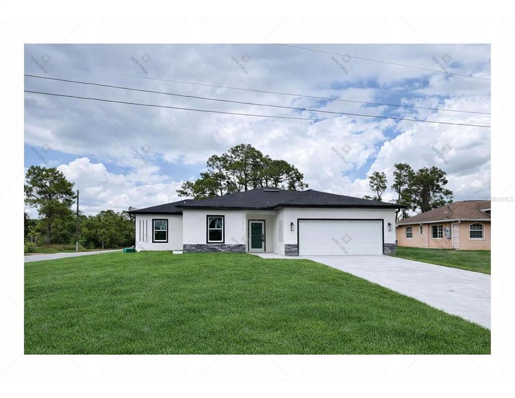 Photo of 4018 3rd Street W, Lehigh Acres, FL 33971 (MLS # S5147925)