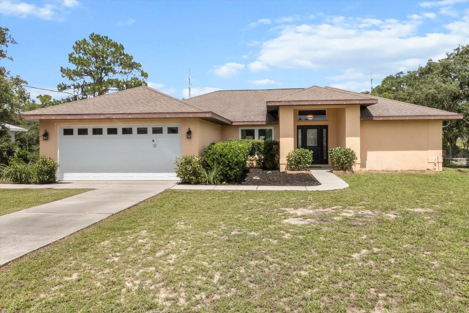 One or more photo(s) has been virtually staged. THE OUTDOORSMAN AND THE WONDERFUL, AMAZING, VERY GOOD DAY! This 1760sqft, 3 bed/2.5 bath home sits tucked away in the community of The Hills of Avalon and conveniently adjoins the scenic Suncoast Trail for super easy access right from your own backyard. Every day can be an adventure, and an incredible dream come true for any hiker, cyclist, skater and their 4-legged companion! Serving as a connector trail to several multi use trails, recreational locations and nature parks, this greenway passes through a mix of environments for all trail goers to enjoy along its extensive, 55-mile and growing route; from the SR44 Trailhead off Tipton Terrace in Lecanto to northern Hillsborough County. After a long day on the trail, doing whatever it is you do best, an in-ground 24’x42’ free form fiberglass pool awaits your cool down! Then the covered, screened lanai with a half bath may be the perfect place to rest and contemplate your plans for the next day. Indoors you won’t be disappointed. The open floor plan features a living room with a vaulted ceiling and laminate flooring, a formal dining room and a kitchen with both a raised breakfast bar as well as a breakfast nook, tiled backsplash, pantry closet and plenty of cabinet and counter space with the built-in buffet. The master bedroom features two closets, with one being a walk in, and an ensuite with a tiled shower, separate garden tub and private water closet. New HVAC in 2022 and new windows in 2023 are a plus! A workshop/shed is always handy and a fully fenced yard will make your furry friend happy! Seller is offering a BRAND-NEW ROOF with an accepted offer…so you can choose the color. NO FLOOD ZONE & NO HOA OR DEED RESTRICTIONS! A FREE 1yr home warranty is OFFERED for PEACE OF MIND to the buyer!