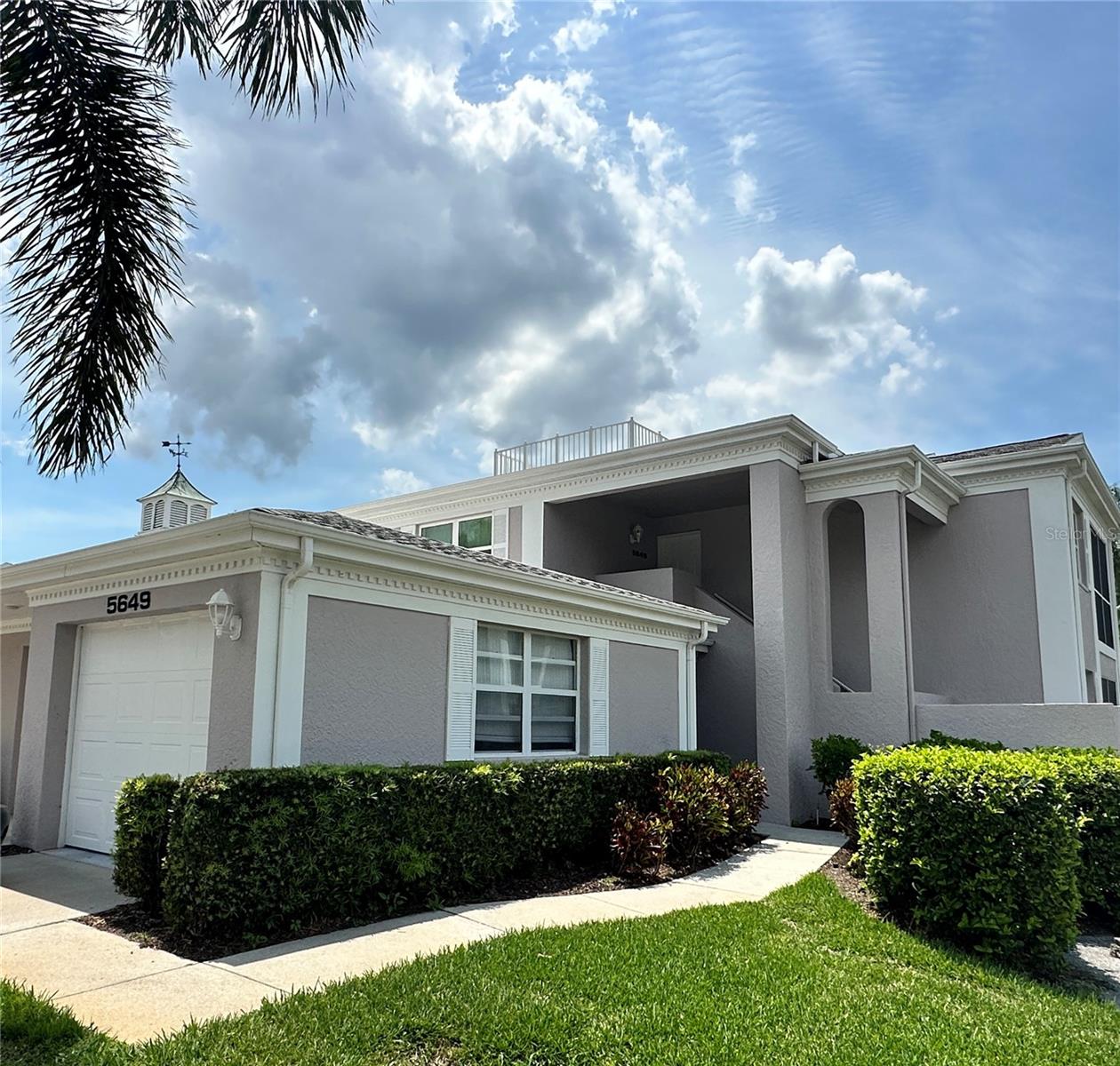 Get ready for the ultimate Sarasota Lifestyle without the hassle. Enjoy peace and tranquility central to beaches, Nathan Benderson park, downtown, golf, shopping, restaurants, entertainment and more. This immaculate (first floor) well appointed 2 bedroom 2 Bath condominium is updated and ready for you. This Abode offers an open spacious floor plan with dual open air patios, views and close proximity to the community pool. A work-in kitchen with a view lends itself to a dinning and living area perfect for you and your guest. You will love the spacious master bedroom with a walk-in closet and a convenient ensuite. A large guest room makes a great space for visitors or an office. Upgrades include a new community maintained roof, garage, tile, carpet, barn door, flooring, vanities, paint, kitchen and more. Plenty of storage with interior linen closets, laundry and a garage. Sheffield Greene is an active community with all the amenities on could desire. Enjoy golf, pickleball, swimming, tennis, clubhouse dinning, trails a state of the art exercise facility and more. Call today for a private showing.