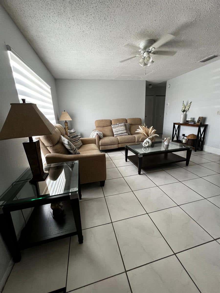 Photo of 26 Las Palmas Way #1, Kissimmee, FL 34743 (MLS # O6431214)