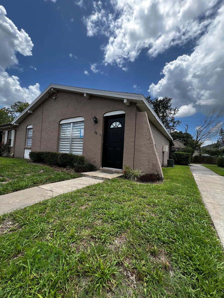 Photo of 26 Las Palmas Way #1, Kissimmee, FL 34743 (MLS # O6431214)