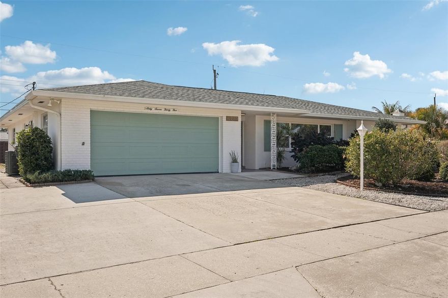 Prepare to be impressed. This fully remodeled Gulf Gate gem is a rare opportunity, offering 1,659 square feet of beautifully reimagined living space where luxury meets everyday comfort.

From the moment you step inside, you’re welcomed by a bright, open-concept layout designed for modern living and effortless entertaining. Expansive sliding glass doors lead to a spacious screened-in lanai, seamlessly blending indoor and outdoor living — the perfect setting for morning coffee, weekend gatherings, or relaxing evenings.

The brand-new custom kitchen is truly the heart of the home, featuring two-tone solid wood cabinetry, elegant quartz countertops, a marble backsplash, and new GE stainless-steel appliances. Every finish was thoughtfully selected to create a refined yet inviting space.

The primary suite offers a peaceful retreat with a walk-in closet and a spa-inspired ensuite bathroom complete with a new double vanity, designer tile shower, and upgraded fixtures as well as a dedicated recirc pump for near instant hot water. Throughout the home, new luxury vinyl plank flooring, fresh interior paint, modern lighting, ceiling fans, and new interior doors create a clean, contemporary coastal feel.

Major upgrades provide peace of mind for years to come, including a new shingle roof (2026), new HVAC system (2026), new electric panel (2026), new insulation (2026), Water Heater(2026) and fully replumbed drains and supply lines.

Additional highlights include a large indoor laundry room with a custom boot bench, a two-car garage, and a triple-wide driveway offering ample parking.

Outside, you’ll appreciate one of the home’s most unique and practical features — a beautifully landscaped, low-maintenance front yard with no grass to mow. As one of the only homes in the neighborhood designed this way, it offers enhanced curb appeal while significantly reducing upkeep and water usage.

Just moments to Siesta Key’s sugar-white sands, this Gulf Gate home offers unmatched convenience — walk to A-rated Gulf Gate Elementary, 5 min to Costco, and a dynamic redevelopment of the former Sarasota Square Mall into a vibrant new retail, dining, and residential hub.

This is modern coastal living at its finest — move-in ready and designed to impress.

Buyer’s agent to verify all MLS information including room sizes, utilities, and HOA (if applicable).