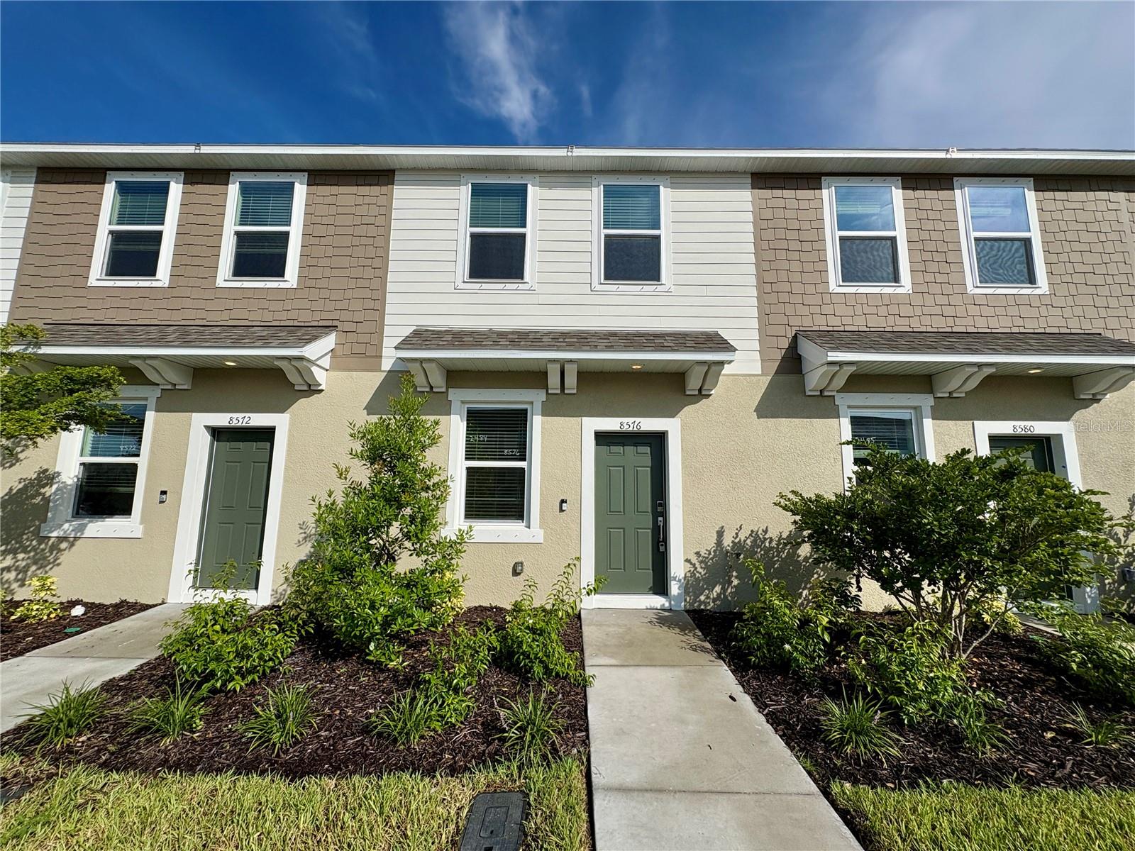 For Rent! Unfurnished Annual Rental! Pet Friendly! Be the first to live in this stunning new construction townhome located in the highly sought-after Skye Ranch community! This beautifully designed 2-bedroom, 2.5-bathroom townhome offers stylish, low-maintenance living with modern finishes and thoughtful details throughout. Step inside to an open and airy main level with tile flooring, high ceilings, and a gourmet kitchen featuring stainless steel appliances, granite countertops, a large center peninsula, and plenty of cabinet space. The spacious living and dining areas flow seamlessly to a private patio, perfect for enjoying your morning coffee or relaxing in the evening. Upstairs, you'll find two generously sized bedroom suites, each with their own full bathroom and ample closet space, roommates, or a work-from-home lifestyle. A convenient half bath is located on the main floor. With top-rated schools nearby and easy access to I-75, downtown Sarasota, and the award-winning Gulf beaches, this is a location that perfectly blends tranquility and convenience. Washer and Dryer included with the home.
Want to stay close to friends or family? You're in luck as the unit 2 doors down is also available on the same floorplan!