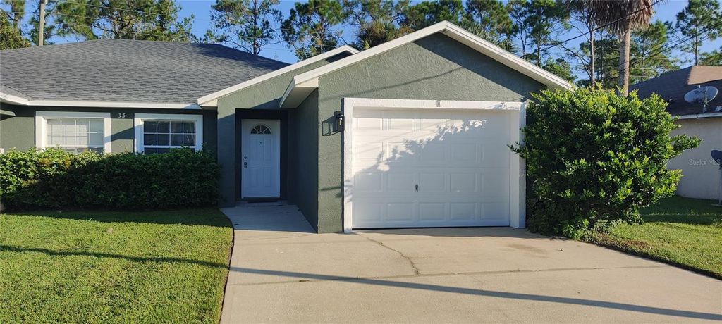 Photo of 33 Pine Haven Drive #B, Palm Coast, FL 32164 (MLS # FC314777)