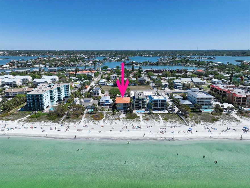 Welcome to paradise! Live a life that’s surrounded by natural beauty and enjoy the relaxing Florida lifestyle with the white sands of Indian Rocks Beach at your back door. This is a once in a lifetime opportunity to own this Gulf front townhome duplex that offers a multitude of possibilities. Both homes are filled with designer details and quality craftsmanship including soaring ceilings, arched doorways, shiplap and gorgeous millwork. The open concept in both units features a large kitchen that is open to the family room where a wall of sliders frames the mesmerizing water views. A covered porch allows endless views of the beach and spectacular Gulf sunsets. Custom stairways lead upstairs to the bedrooms. The primary bedrooms offer a luxurious retreat with beautiful ensuite baths and sliders opening to a private covered balcony room overlooking the Gulf and beaches.  After a day enjoying the sparkling gulf waters, you can enjoy entertaining family and friends under the spacious covered patio and await the evenings spectacular water-colored sunsets and tropical breezes. Ideally located close to local shops, restaurants and attractions this opportunity won’t last. Corresponding MLS ID: U8194471