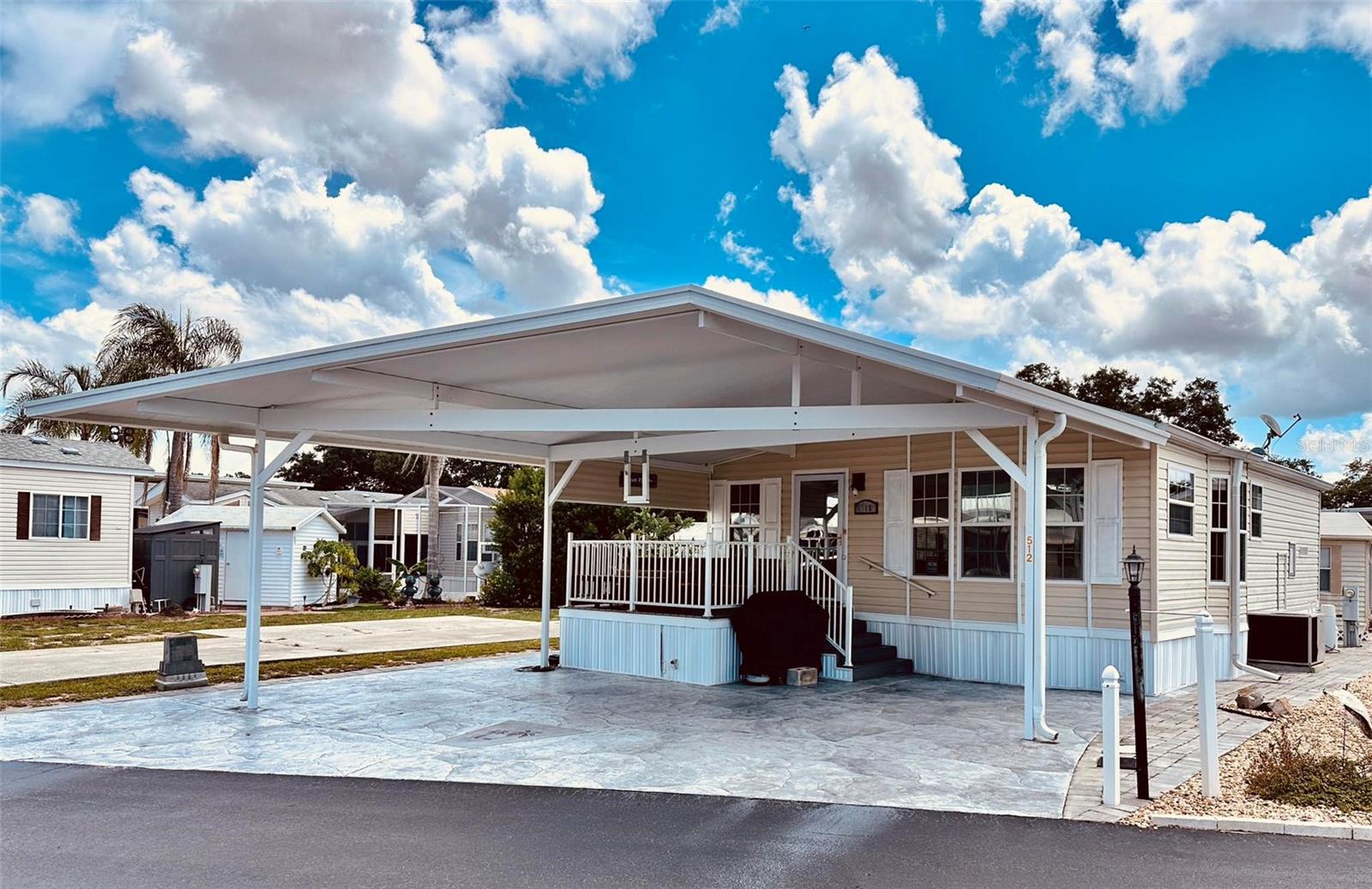 WELCOME TO DEER CREEK RV GOLF & COUNTRY CLUB! Enjoy RESORT STYLE LIVING at its best at this 55+ Oasis! If you’re looking for the perfect spot to live year around or a winter getaway in the sunshine state, this is it! Live your best life in Partridge Pines Community located in Deer Creek! This one bedroom, two bath newly updated home is move in ready & boasts an open concept living, dining & kitchen area that is beautifully done. Freshly painted & all new flooring with tile in the kitchen & bathrooms. Feel the roomy vibes with the stick built addition! The covered front deck is a great place for relaxing or entertaining with family & friends. What a great spot to enjoy your morning coffee, read your favorite book or visit with neighbors! There’s ample parking for your vehicles & golf carts under the covered carport! You’ll love the shed for storing your golf clubs & pool floats! The Partridge Pines Community Clubhouse, Pool, Hot Tub & many FUN activities are just a golf cart ride away! If you love RESORT style living, this is the place for you! Deer Creek Community has a MAIN CLUBHOUSE offering a variety of social events throughout the year such as Karaoke, Trivia, Cardio Drumming, Line Dancing, Crafts, Swing Dancing & more! Soak up the sun at Deer Creek’s MAIN pool, cabana & hot tub area! Try water volleyball, pickleball, tennis, shuffleboard or pool aerobics! Love golfing? Check out Deer Creek’s 18 Hole Executive Golf Course, Leagues & great shopping at the Pro Shop! The Tiki Bar or The Topside Tavern is a great place to meet new friends with occasional live bands & music! The Greenside Grill is perfect for onsite dining! Deer Creek is centrally located in Davenport just 20 minutes from Disney & all the attractions that families enjoy! Hop on your golf cart & ride to many restaurants & shops nearby. Bealls, Marshalls, Target & Star Bucks are in Posner Park less than a mile away! The Orlando International Airport & the VA hospital are within 30 – 40 minutes! Just 1.5 hours to each coast! Call today to view this HIDDEN GEM in sunny central Florida!