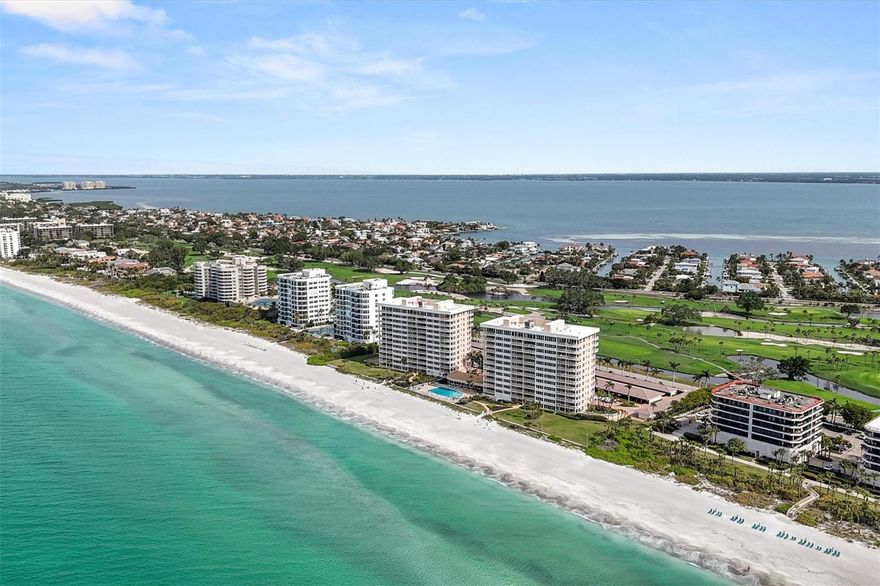 Indulge in the epitome of coastal living within this meticulously designed 2,420-square-foot renovated corner condominium, gracefully perched on the 11th floor on the beach of the Gulf of Mexico. Discover the allure of sweeping vistas capturing the turquoise hues of the Gulf waters and the tranquil allure of Sarasota Bay. Step onto these expansive terraces and feel the gentle Gulf breezes while enjoying the stunning views. This is an extension of your living space. Dine al fresco with a backdrop of the shimmering Gulf, savor your morning coffee as the sun rises over the horizon, or simply unwind in the glow of our famous sunsets over the Gulf. As daylight fades, see the sparkling lights of downtown Sarasota come to life across the bay. This residence features a spacious open floor plan, an inviting kitchen with a substantial island, and three bedrooms with accompanying full baths, each meticulously designed for both luxury and functionality. The soothing color palette of this home reflects the coastal landscape, forging a seamless connection between indoor and outdoor living. Thoughtfully designed, this home provides built-ins, ample storage, and a utility/laundry room. Longboat Towers is located behind the gates of the Longboat Key Club and has its own 24-hour attended gatehouse. There is a beautiful private pool for the community, a gym onsite, and a community club room for social gatherings. The beach has lounges and umbrellas ready for you to enjoy. This is more than a condominium- it's a sanctuary where luxury, comfort, and captivating views converge. Seize the opportunity to make this extraordinary property your own, where every moment is a celebration of the coastal lifestyle, enhanced by close access to the restaurants and arts scene in downtown Sarasota. With the purchase of membership to the Longboat Key Club, you have access to over 55 holes of golf, five exclusive restaurants, a world-class tennis/pickleball facility, and a luxury spa and gym.