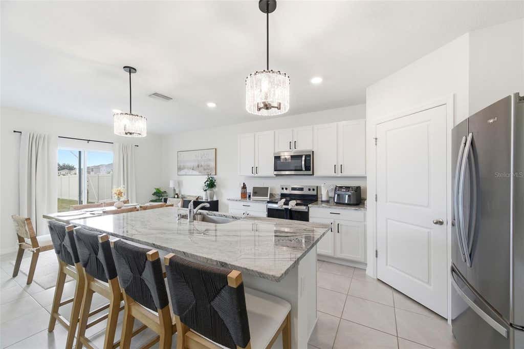 Photo of 8210 Dolphin Bluff Boulevard, Wesley Chapel, FL 33545 (MLS # TB8517145)