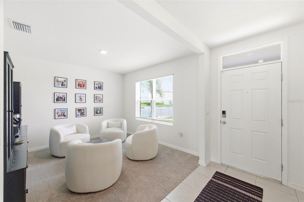 Photo of 8210 Dolphin Bluff Boulevard, Wesley Chapel, FL 33545 (MLS # TB8517145)