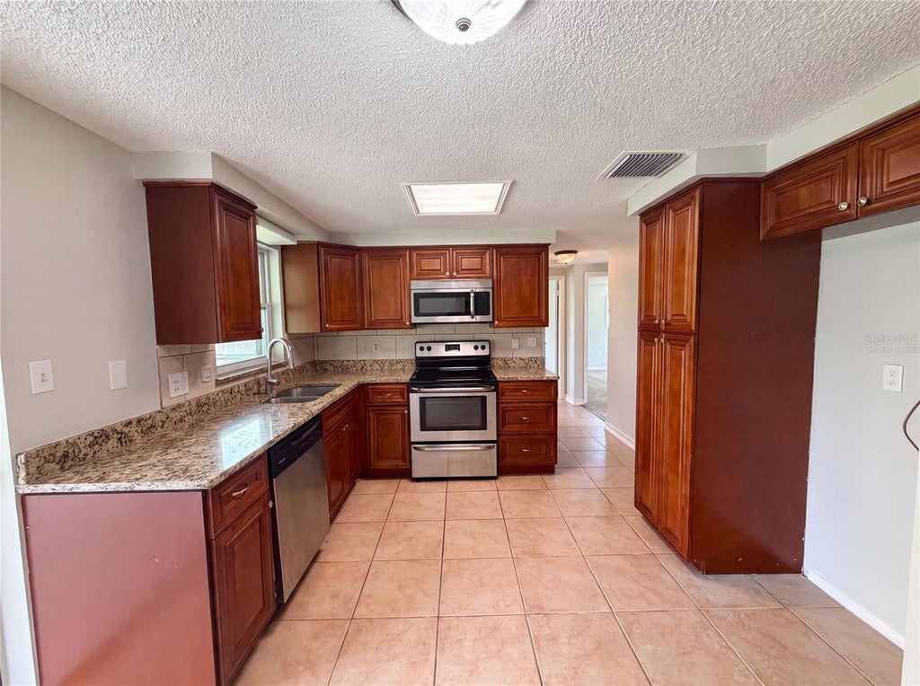 Photo of 3412 Nixon Road, Holiday, FL 34691 (MLS # O6428899)