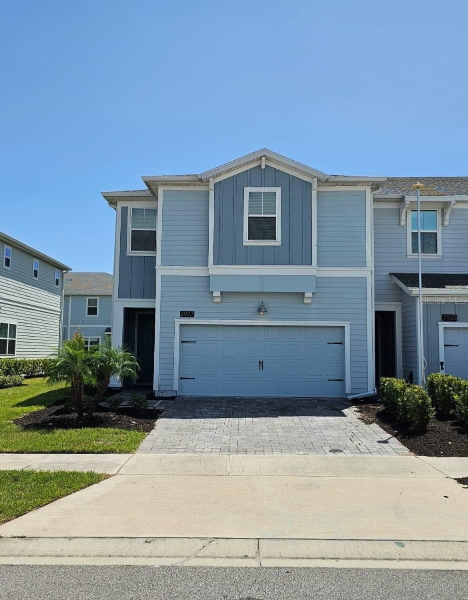 This charming townhome, situated in the heart of Kissimmee, features four bedrooms and three and a half bathrooms. The open floor plan creates an expansive kitchen with a huge view of the roomy family room. All the bedrooms are located upstairs, including a large master suite with a walk-in closet. The home is adorned with numerous luxury features such as quartz countertops, 42" cabinets, slate appliances, window blinds, brick pavers, and more. This home is situated in the secure gated community of Reflections at Storey Lake Park. The prime location is where Central Florida's main attractions are only minutes away: Disney World, Lake Buena Vista, shopping centers and various dining options. The community offers cable, internet, and phone services. This resort-style community includes amenities like a community pool, fitness center, dog park, and playground with slides. This townhome is a lifestyle. It is a long-term community with no short-term leases allowed. The home has been remodeled with new vinyl flooring and more. READY TO MOVE IN! EASY TO SHOW! LOCKBOX!