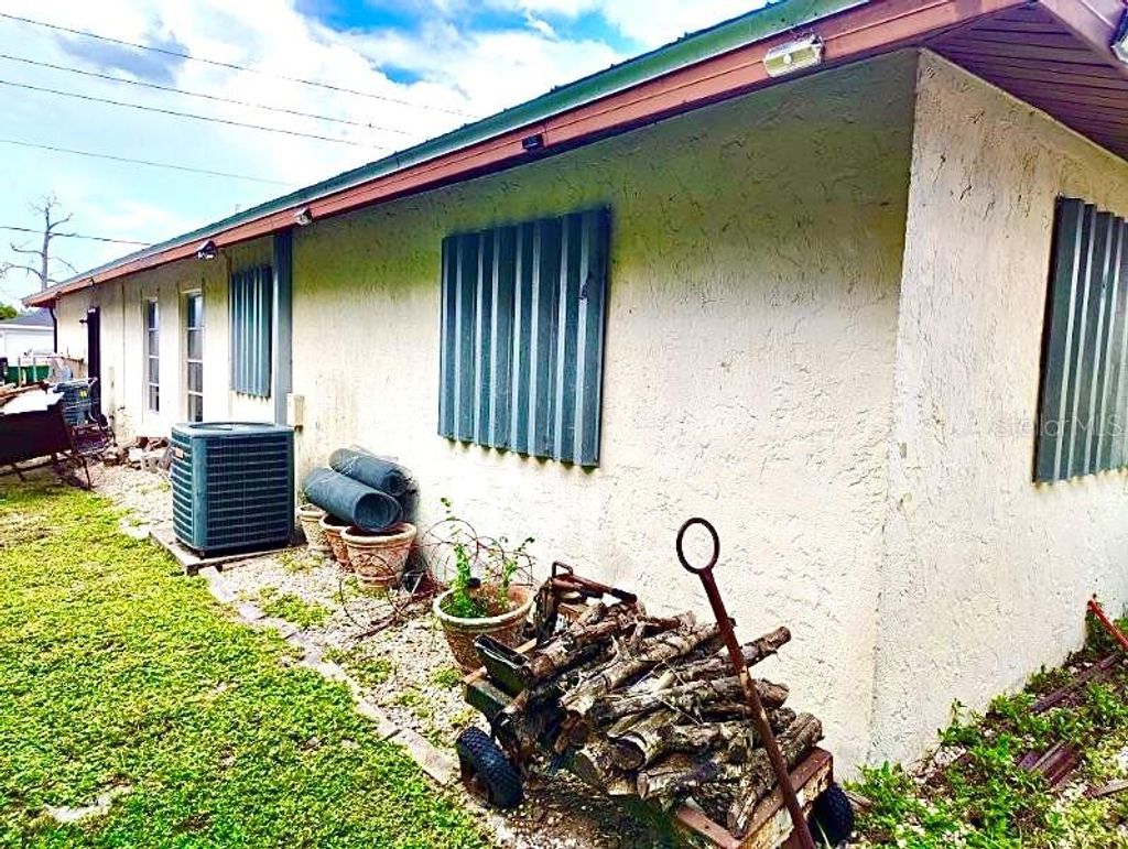 Photo of 22275 Elmira Boulevard, Port Charlotte, FL 33952 (MLS # TB8414273)