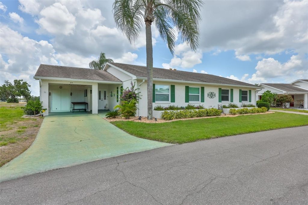 Photo of 214 Glenellen Place #201, Sun City Center, FL 33573 (MLS # TB8508462)