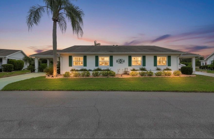Beautifully remodeled and lovingly maintained, this stunning extended Hampton model in the highly sought-after 55+ gated community of Kings Point offers extraordinary water views, and exceptional upgrades. From the moment you arrive, you are greeted by a spacious expanded entry featuring a beautiful stained-glass front door and matching stained-glass panel that create an inviting first impression. The thoughtfully designed entryway also provides convenient access to the interior laundry and golf cart storage area through a dedicated golf cart garage door.

Step inside to discover an open and welcoming floor plan filled with modern updates and tasteful finishes throughout. The spacious great room showcases Berber carpeting, updated modern lighting, and flows seamlessly into the dining area and beautifully remodeled kitchen. The kitchen has been enhanced with new countertops, stylish backsplash, New GE appliances, updated sink and faucet, pantry space, planning center, and casual dining area.

The Florida room is truly the centerpiece of this home. Accessed through elegant French doors, this expansive tiled space features updated roller shades, ceiling fan, and breathtaking water views that create the perfect setting for morning coffee, entertaining guests, or simply relaxing and enjoying Florida’s natural beauty. Beyond the Florida room, the patio has been extended to further maximize outdoor enjoyment and peaceful waterfront living.

Both bedrooms are privately situated toward the front of the home, offering comfort and tranquility. The spacious primary suite features a large walk-in closet and beautifully updated en-suite bathroom with remodeled shower, new vanity, and updated fixtures. The guest bathroom has also been tastefully renovated. Additional upgrades include new flooring in the kitchen, bathrooms, and laundry room, new washer and dryer, 2023 hot water heater, upgraded lighting throughout, and numerous thoughtful improvements that make this home truly move-in ready.

Located in the resort-style community of Kings Point, residents enjoy an incredible array of amenities including multiple clubhouses, indoor and outdoor pools, fitness centers, golf, pickleball, tennis, arts and crafts studios, live entertainment, dining venues, countless social clubs, and miles of golf cart-friendly roads. Kings Point offers maintenance-free living with 24-hour gated security and easy access to Tampa, Sarasota, beaches, shopping, dining, and medical facilities. Experience the active Florida lifestyle you deserve in one of Sun City Center’s most desirable communities. This beautiful remodeled waterfront condo is the kind of rare Kings Point gem buyers wait for! Don't miss your opportunity to see it before someone else makes it their own!!