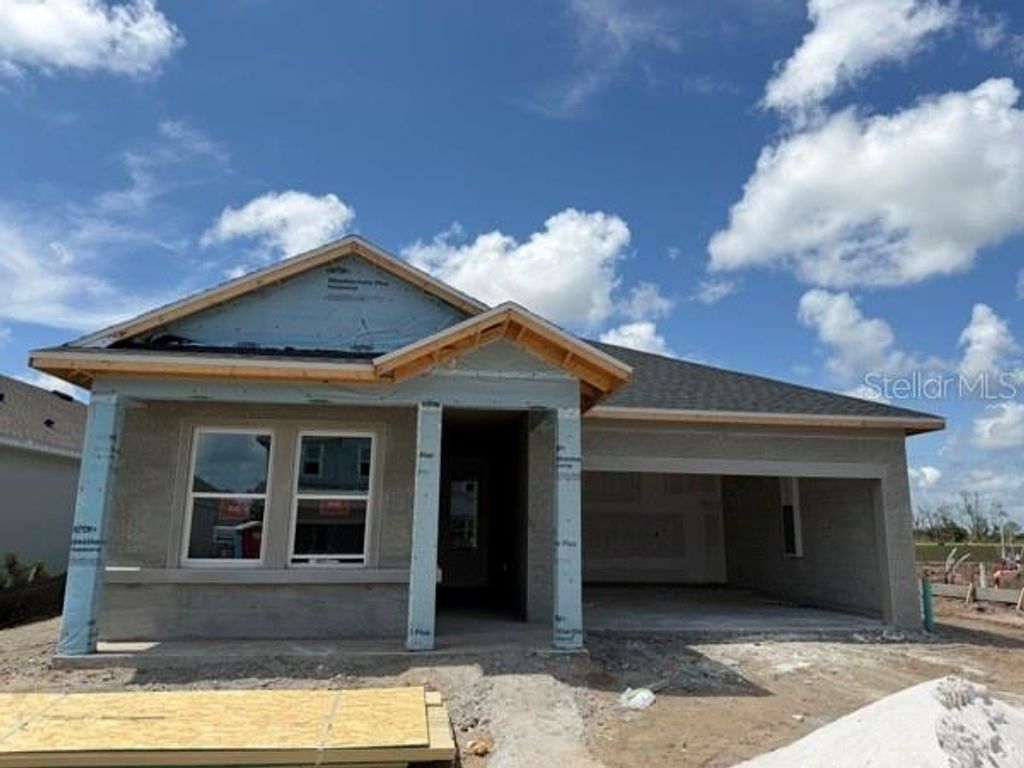 Photo of 10665 Crescent Creek Crossing, Parrish, FL 34219 (MLS # TB8509758)