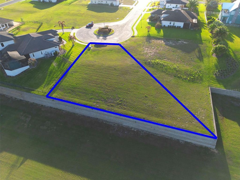 Photo of 250 Amaryllis Way, Lake Alfred, FL 33850 (MLS # L4960185)