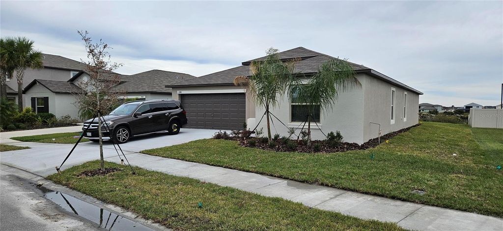 Photo of 8598 Parsons Hill Boulevard, Wesley Chapel, FL 33545 (MLS # O6375372)