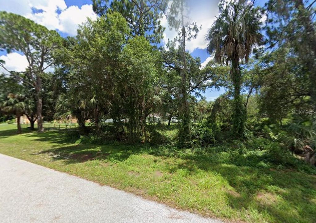 Photo of 16053 Arcaro Avenue, Port Charlotte, FL 33954 (MLS # C7521519)