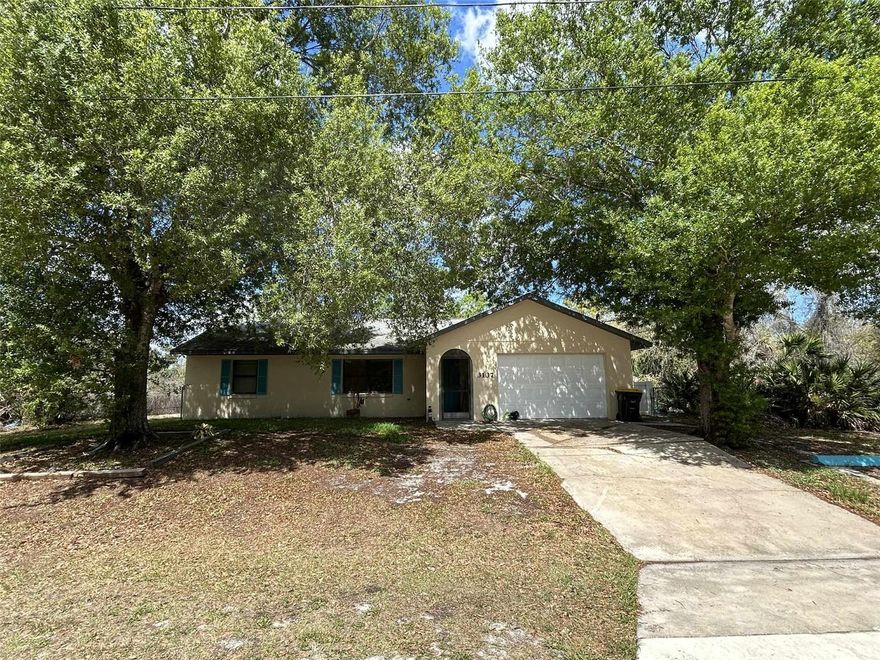 Tucked away in a peaceful rural setting, this 2-bedroom home offers the perfect opportunity to create your own private
retreat. Featuring a desirable split floor plan, the layout provides added privacy and functionality, ideal for both full-time
living or a weekend getaway. Inside, the home offers a bright living space with a natural flow between the living, kitchen,
and dining areas. Each bedroom is positioned on opposite sides of the home, making it comfortable for guests or shared
living. A standout feature is the air-conditioned lanai, lined with windows that invite in natural light and allow you to enjoy
the surrounding landscape year-round—an ideal spot for relaxing, reading, or entertaining. Set on a spacious lot, the
property offers a large yard with plenty of room for outdoor activities, gardening, or simply enjoying the quiet, rural
surroundings. This home is being sold as-is and does need some TLC, making it a great opportunity for buyers looking to
add their own personal touch or invest in a peaceful property with potential.