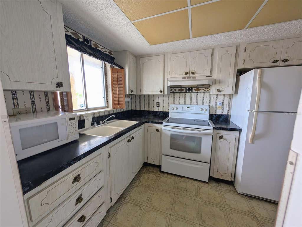 Photo of 3714 Lake Bayshore Drive #K-418, Bradenton, FL 34205 (MLS # A4697805)