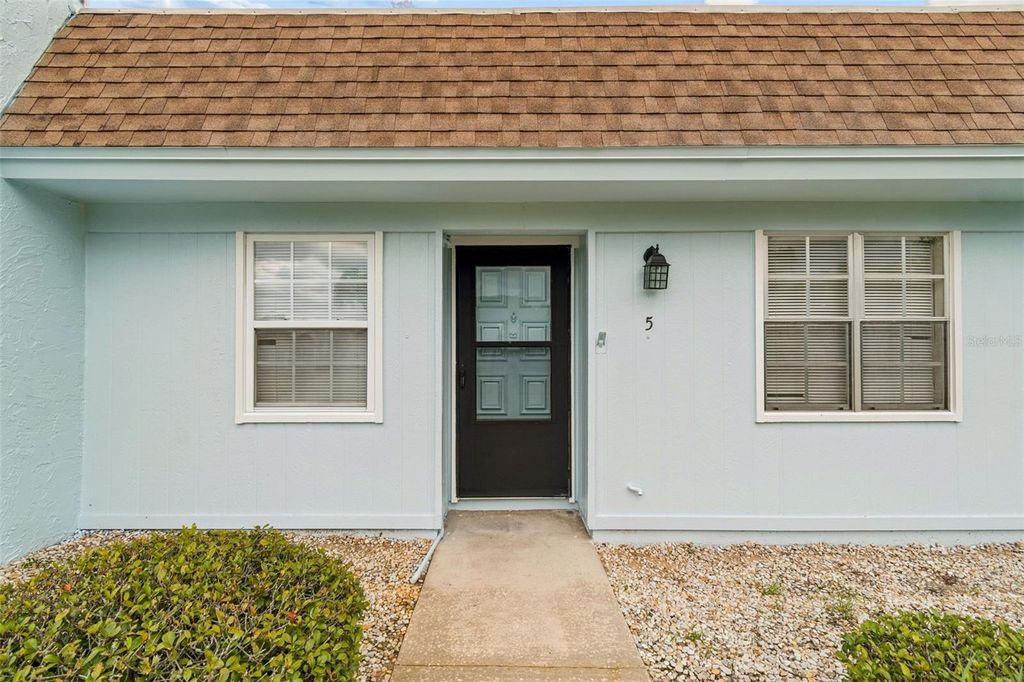 Photo of 11110 Carriage Hill Drive #5, Port Richey, FL 34668 (MLS # TB8532779)
