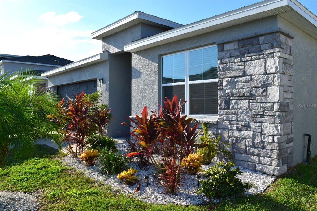 Photo of 31871 Treasure Dock Isle Isle, Wesley Chapel, FL 33545 (MLS # TB8427627)