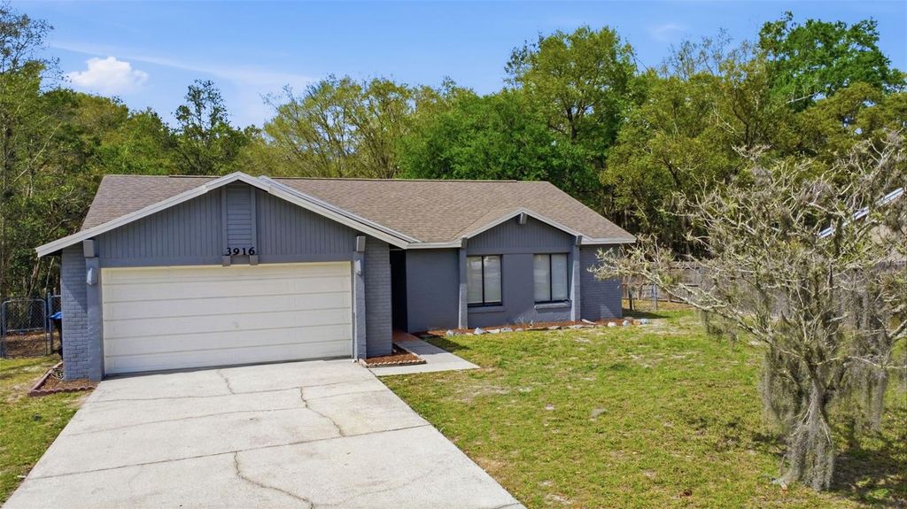 Photo of 3916 Valencia Grove Lane, Orlando, FL 32817 (MLS # O6390980)