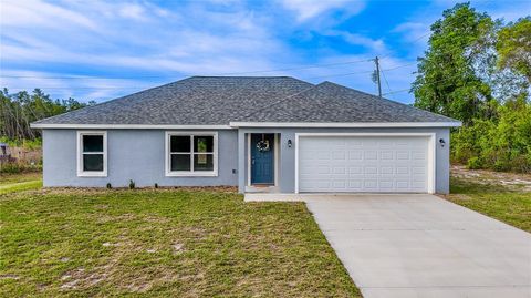 Photo of 15673 SW 37th Circle, Ocala, FL 34473 (MLS # OM723293)