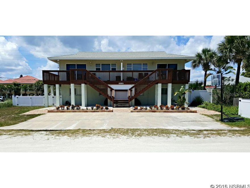 Under contract taking backups. Unbeatable Location! Literally steps to beach walkover. Fall asleep to the sound of the waves! Totally Remodeled! Tile Throughout. Currently set up as a duplex with both sides rented for a total of $2560 per month. 1 Kitchen has Granite. The other kitchen is hand-painted "Bamboo" by a local artist w/ concrete counter tops. 2 Indoor Laundry Rooms. Excellent opportunity for anyone wanting to convert to their dream home! Lot goes from Hill St thru to Atlantic making it conducive to adding a garage. 1 AC new in '15 & 1 AC new in '16 ;Water: City