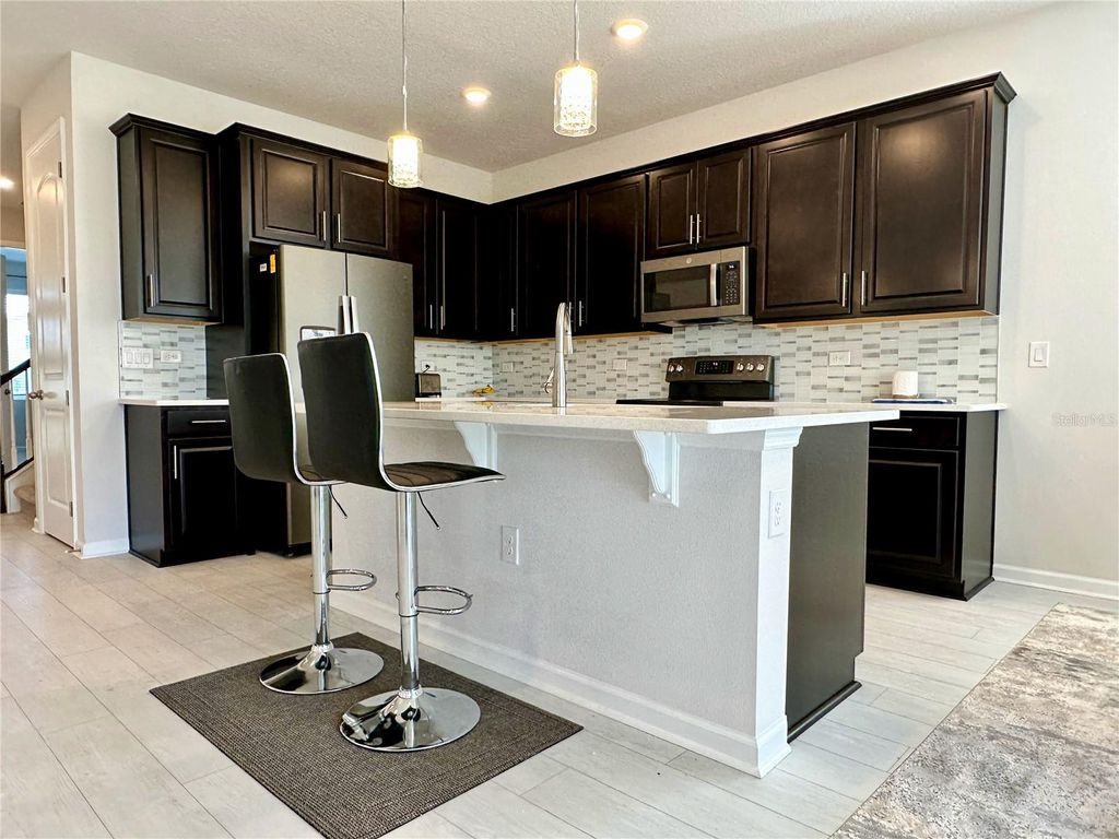 Photo of 2612 Magnolia Avenue, Davenport, FL 33837 (MLS # S5138007)