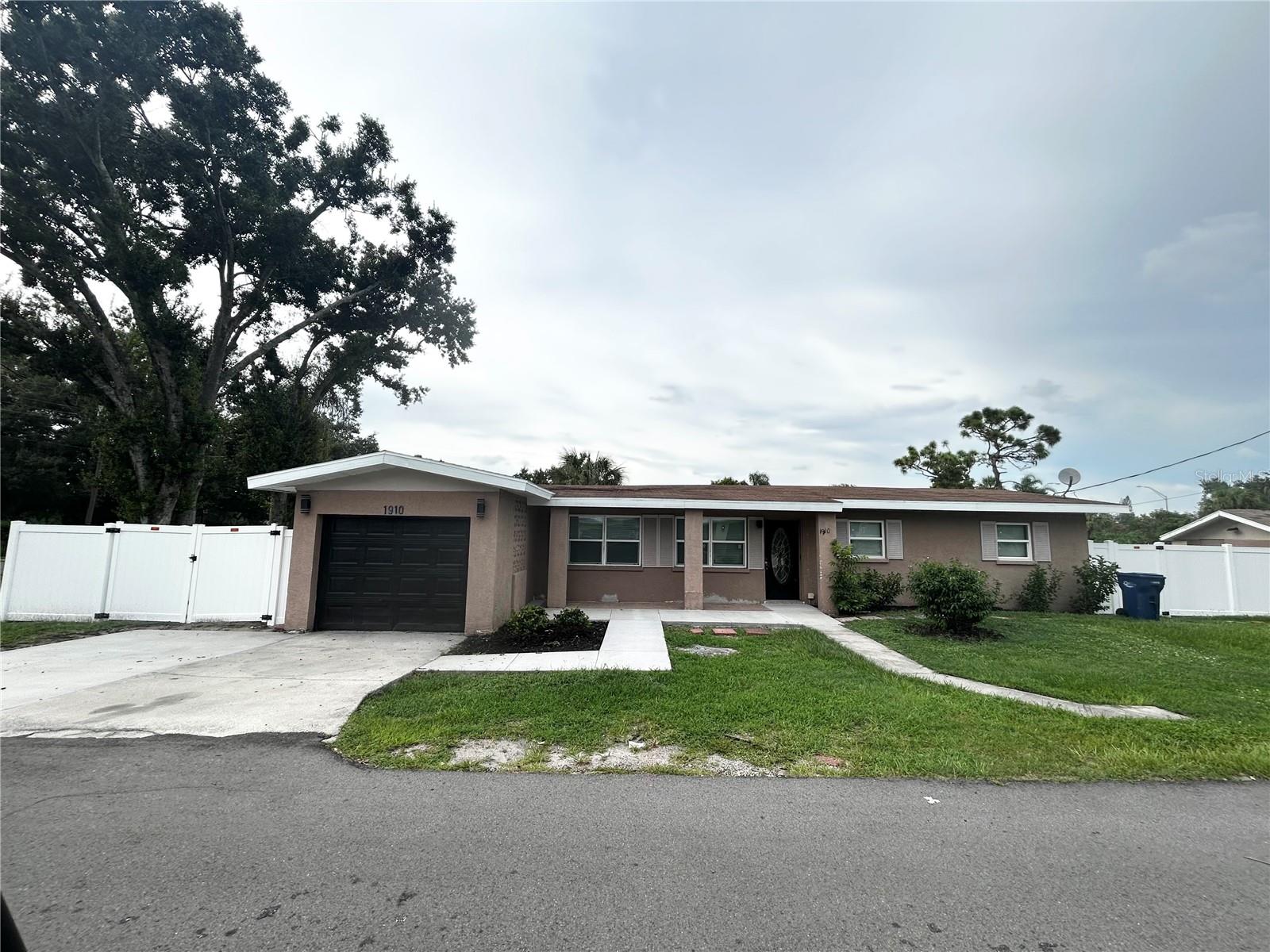 Updated 4BR/2BA with Yard Maintenance Included! Enjoy this updated corner-lot home featuring a privacy fence, garage, and split floor layout. W/D hookup. Scheduled lawncare, AC maintenance, and pest control are included, so you can relax and enjoy your home without the heavy work. Located just minutes from shopping, dining, and the interstate. Pet-friendly dogs welcome with a deposit. Don't miss out on this move-in ready home with everything you need for comfort, convenience, and style! No HOA. HUD welcome. Non-refundable application fee required. 1 year lease, first month's rent and security deposit due at signing. Tenant is responsible for all utilities (water, gas, and electricity).