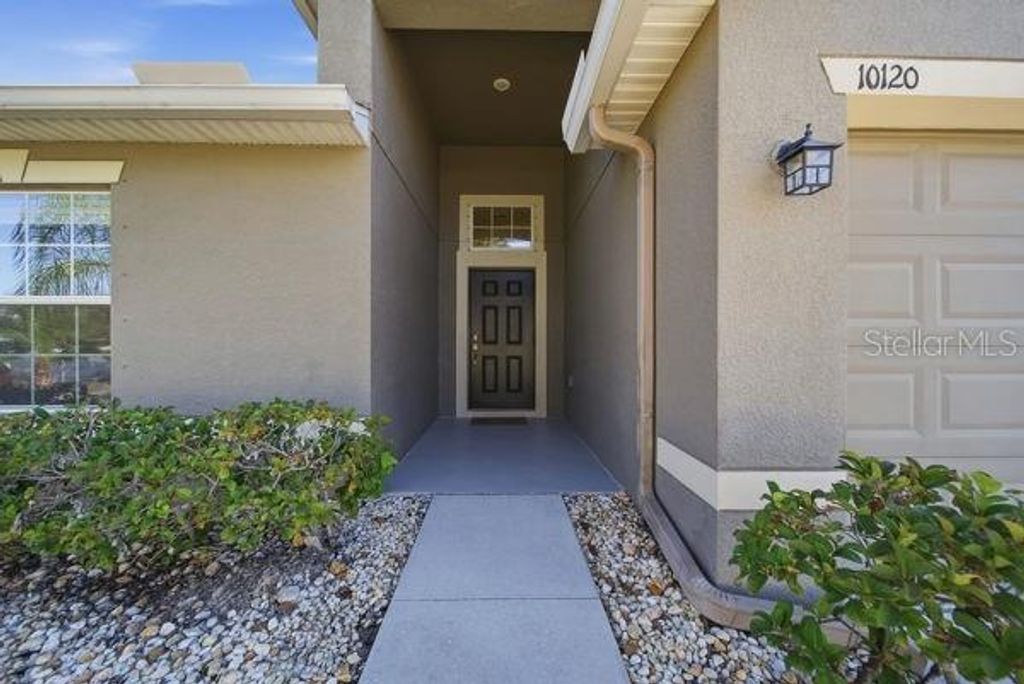 Photo of 10120 Ives Loop, Hudson, FL 34667 (MLS # TB8449575)