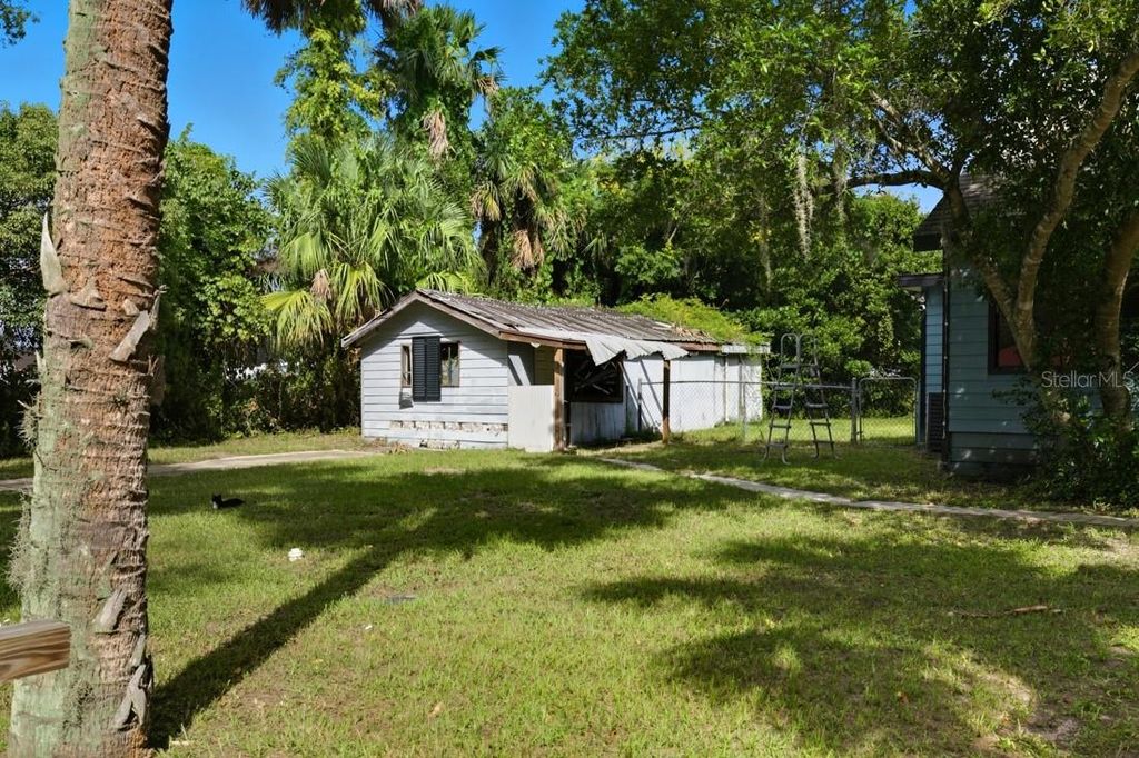 Photo of 711 S Palmetto Avenue, Deland, FL 32720 (MLS # O6350459)