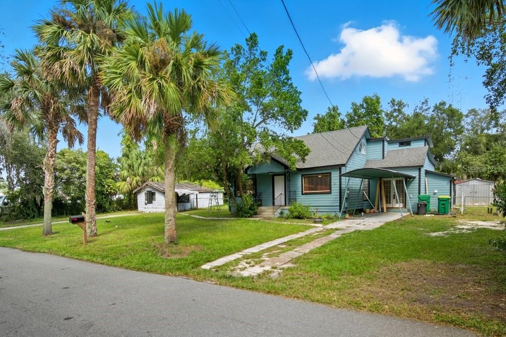 Photo of 711 S Palmetto Avenue, Deland, FL 32720 (MLS # O6350459)