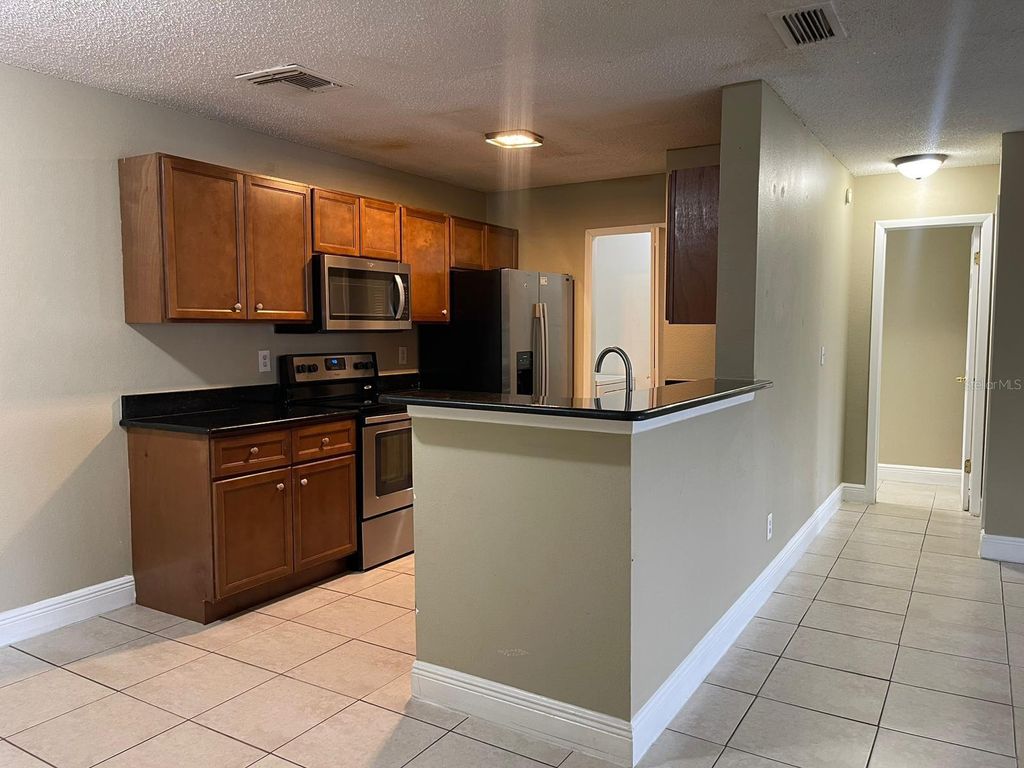 Photo of 2260 Cascades Boulevard #105, Kissimmee, FL 34741 (MLS # S5143559)