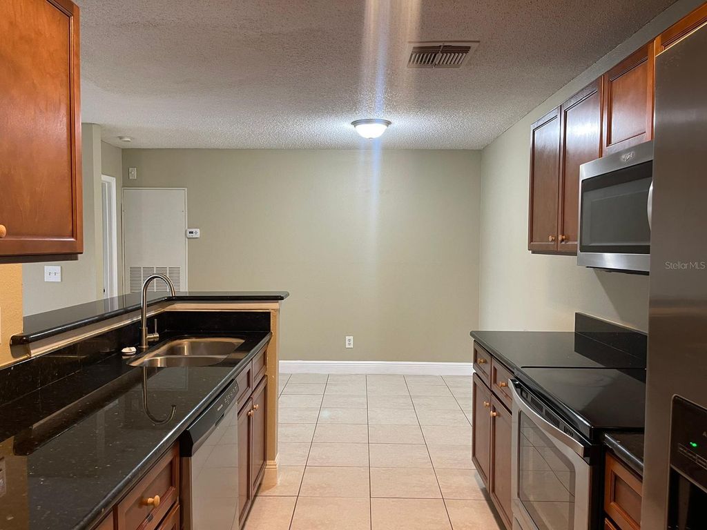 Photo of 2260 Cascades Boulevard #105, Kissimmee, FL 34741 (MLS # S5143559)