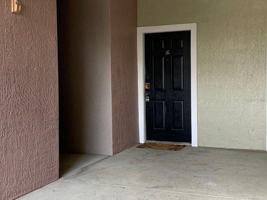 Photo of 6685 Queens Borough Avenue #206, Orlando, FL 32835 (MLS # O6377426)