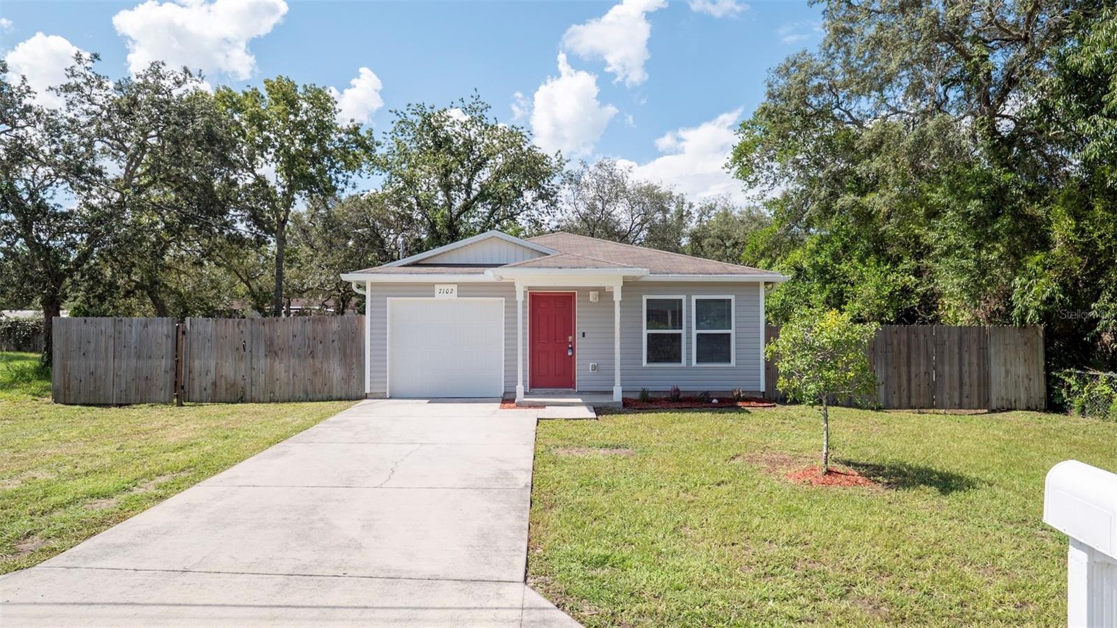 Welcome to this charming 2019-built single-story home with an attached garage! This move-in ready residence features an open-concept layout that connects the living room and kitchen—ideal for entertaining or everyday living. The owner’s suite includes a private en-suite bath, while two additional bedrooms and a second full bathroom offer comfort for family or guests. Enjoy the benefit of no water bill thanks to a private well and septic system, plus a whole-house water conditioning system for added convenience.