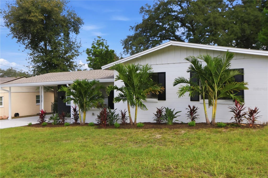 Photo of 1727 N Powers Drive, Orlando, FL 32818 (MLS # O6453552)