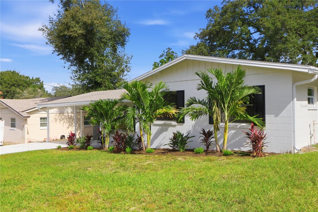 Photo of 1727 N Powers Drive, Orlando, FL 32818 (MLS # O6453552)
