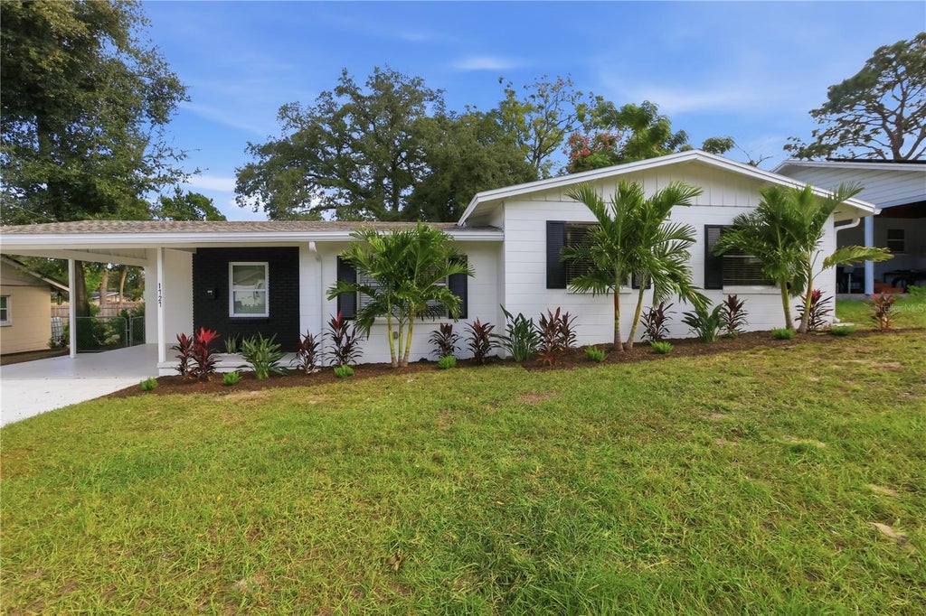 Photo of 1727 N Powers Drive, Orlando, FL 32818 (MLS # O6453552)