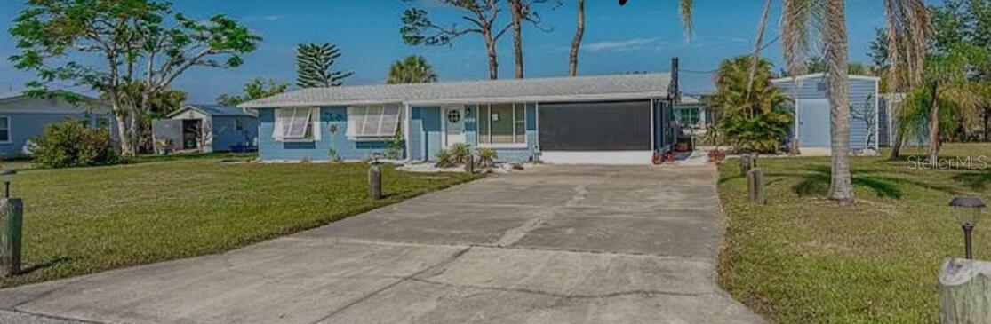 WATERFRONT HOME TO GULF. NO FLOOD/DAMAGE FROM HURRICANES. FULLY FURNISHED HOME.
Welcome to this inviting home located in Englewood, FL. This property features a spacious layout with ample natural light and a comfortable living area. The kitchen is well-equipped and appropriate for preparing meals and entertaining as it features an open layout with the 10-person dining room table in the beautiful sunroom overlooking the water and large fenced in backyard.
Enjoy the lanai space with shaded screens and adjustable covered windows to block the rain and keep the space cool. The lanai also has a wood fired fire pit with ventilation immediately out the roof. Garden in the homemade Garden bed or hop in the outdoor shower after boating, paddle boarding, or tanning on the dock. Most large boats can fit under the Bridges so long as the tee top is down.
Conveniently situated across from Publix, Winn Dixie, CVS, and near historic Dearborn, Boca Grande, Stump Pass, and Lemon Bay. JUST 5 MINUTES from Manasta key and surrounded by dog parks, trails and amazing restaurants on or off the water. This home has a wonderful opportunity to enjoy all that the area has to accord.