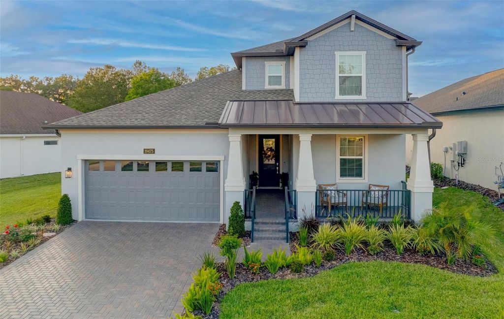 Photo of 19475 Bristol Wood Place, Brooksville, FL 34601 (MLS # TB8375800)