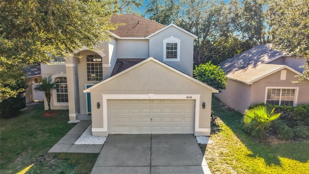 Photo of 4574 Aguila Place, Orlando, FL 32826 (MLS # O6448456)